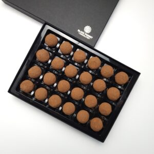 Assortment of 24 handmade champagne truffles.